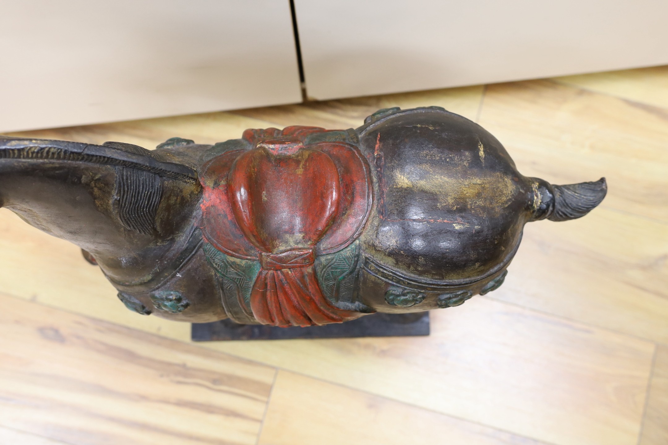 A Chinese carved and painted wood horse, 56cm tall